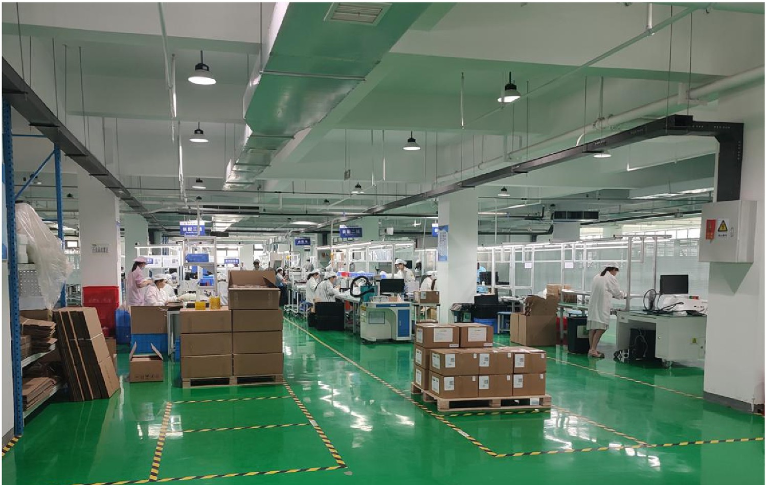 Snowfairy production and packing area - clean, organized workstations where bus air conditioning units are assembled, inspected and packed before delivery